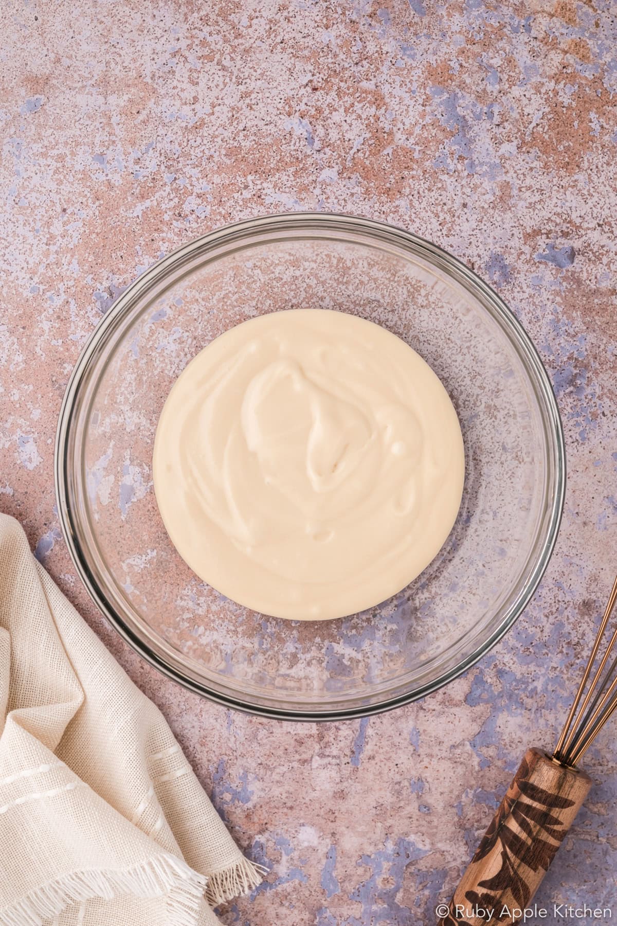 Smooth maple glaze in a mixing bowl.