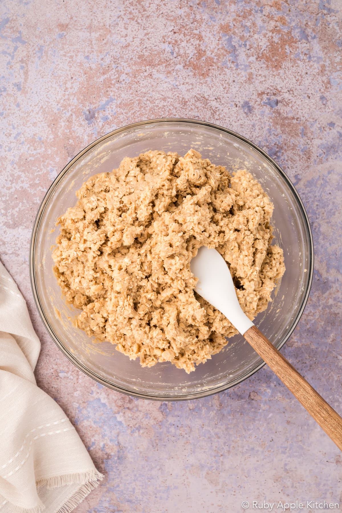 Oatmeal cookie dough with quick oats and Rice Krispies folded throughout.